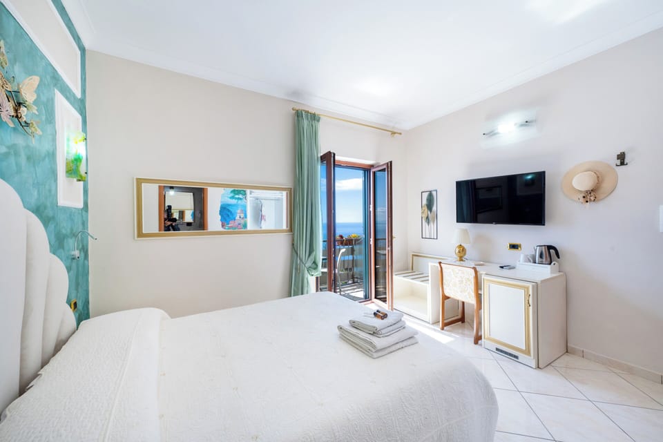 Superior Double Room, Sea View | Premium bedding, down comforters, memory foam beds, minibar