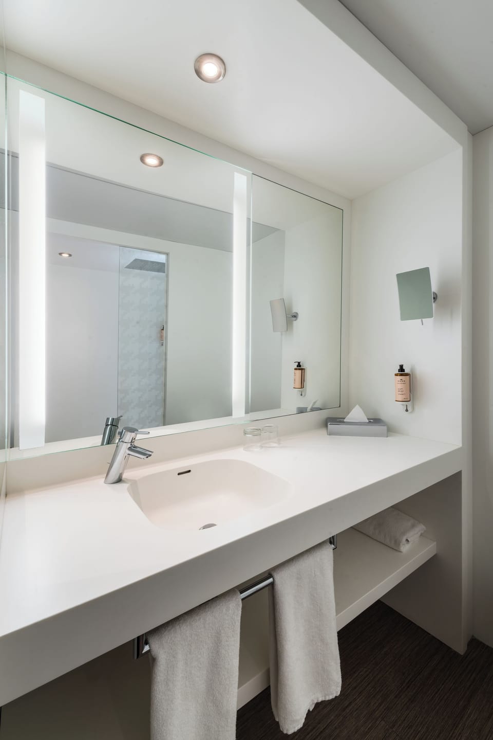Shower, eco-friendly toiletries, hair dryer, towels
