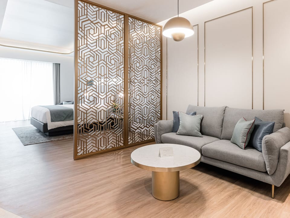 Deluxe Suite (Subject to 2 Double Beds or 1 KingBed) | Living area | LCD TV