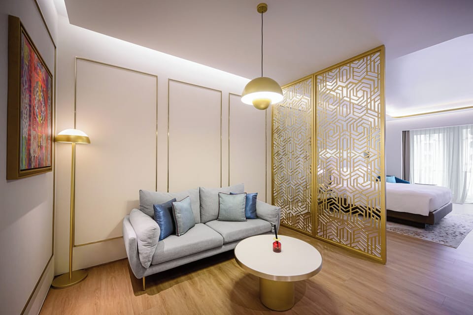 Deluxe Suite (Subject to 2 Double Beds or 1 KingBed) | Living area | LCD TV