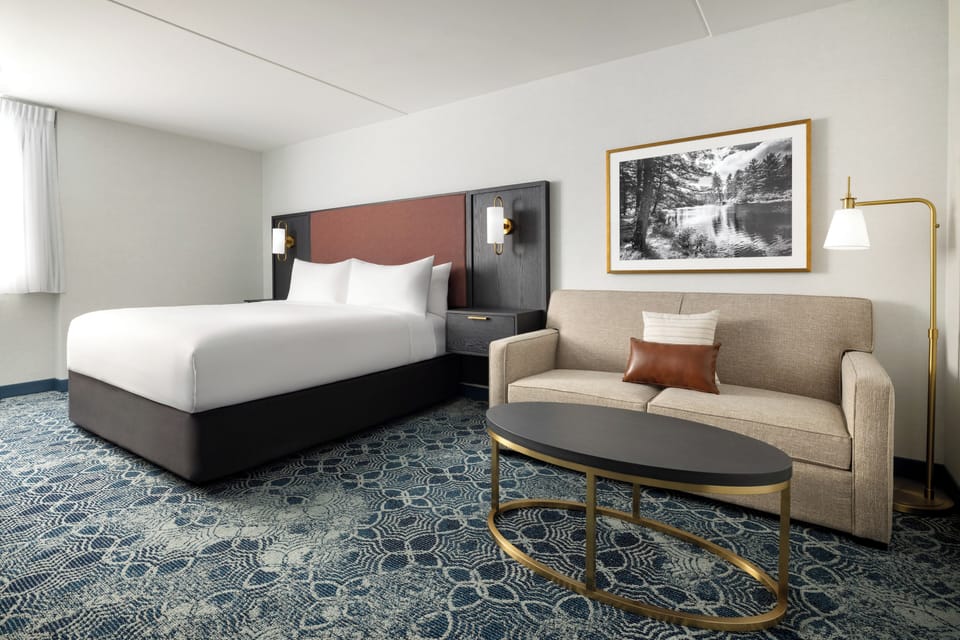 Down comforters, pillowtop beds, desk, laptop workspace