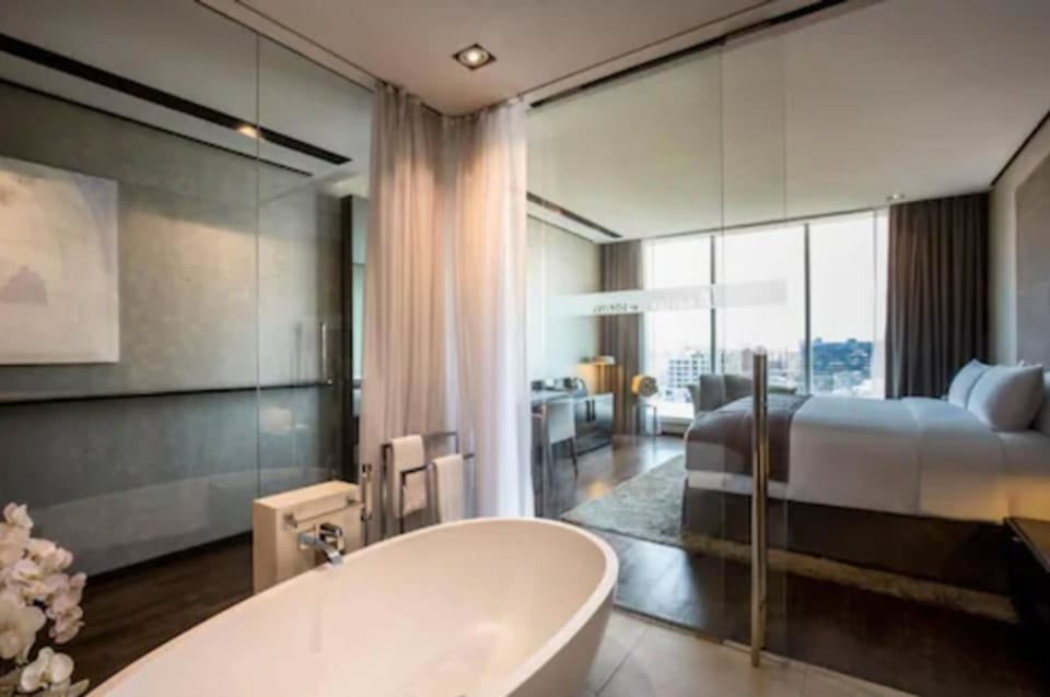 Premium bedding, down comforters, minibar, in-room safe