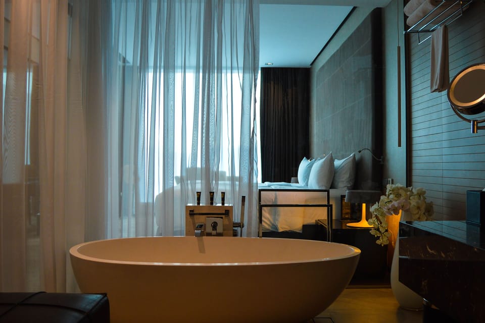 Rainfall showerhead, eco-friendly toiletries, hair dryer, slippers
