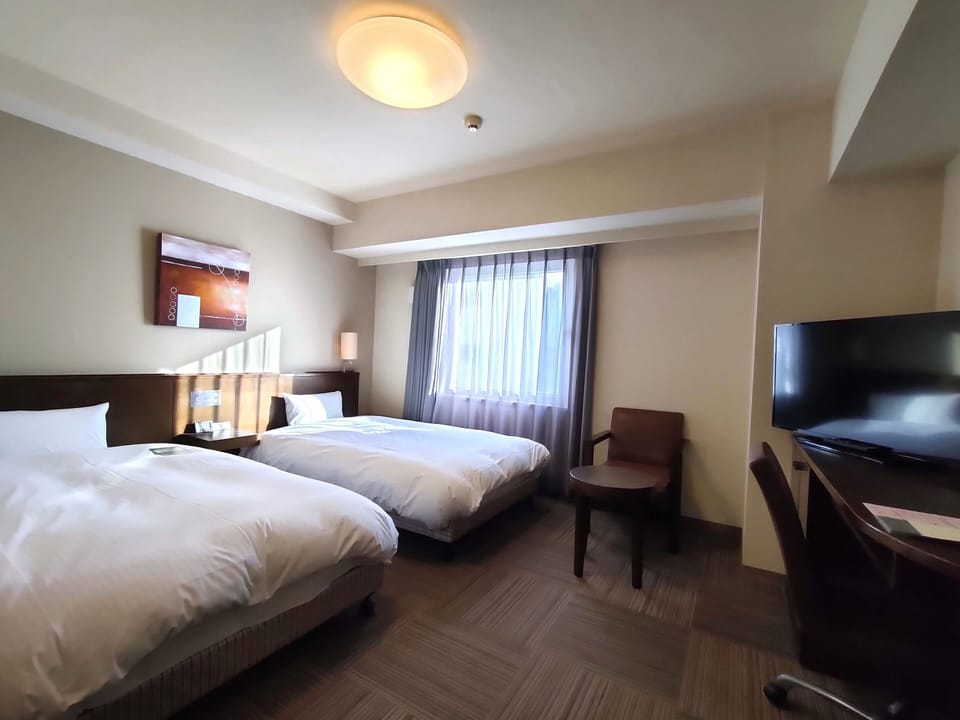 Desk, WiFi (free), bed sheets