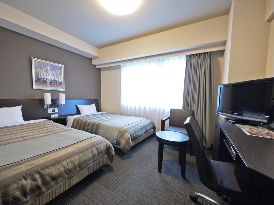 Desk, WiFi (free), bed sheets