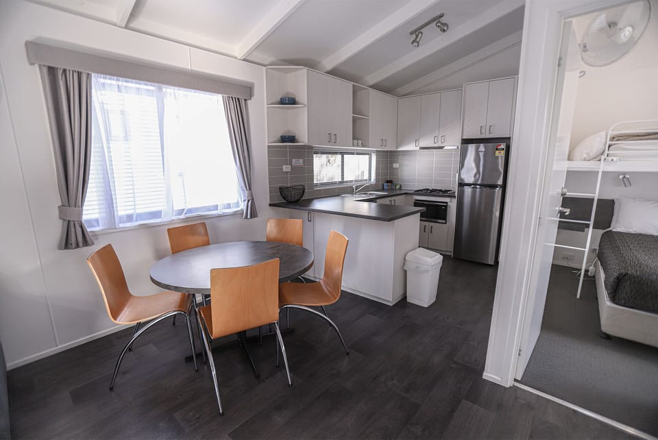 Executive Two-Bedroom Villa | Living area | 30-inch LCD TV with satellite channels