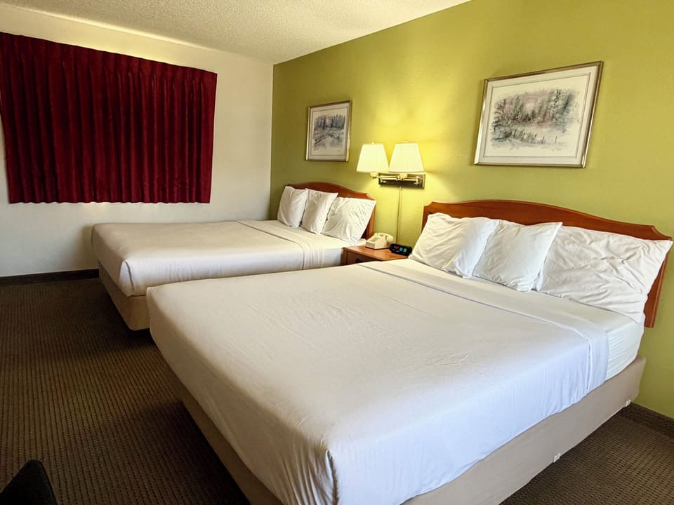 Standard Room, 2 Queen Beds | Iron/ironing board, cribs (free), WiFi (free), alarm clocks