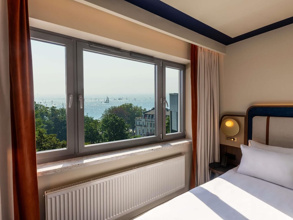 Family Room, 1 Double Bed with Sofa bed, Sea View | Minibar, in-room safe, desk, iron/ironing board (on request)