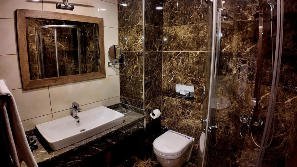 Hair dryer, slippers, towels, soap
