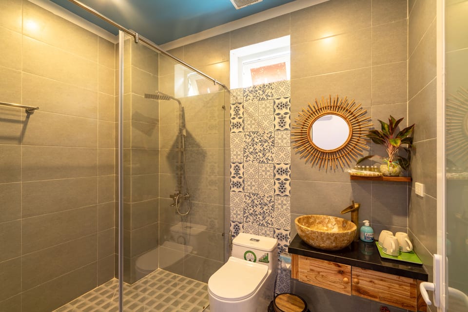 Shower, free toiletries, hair dryer, slippers