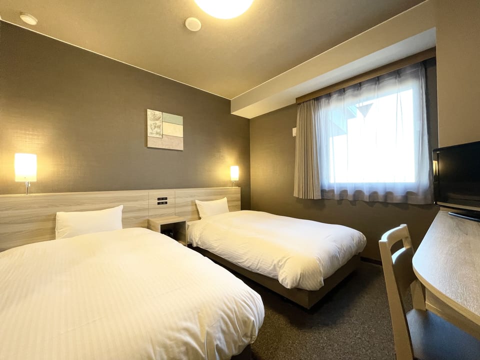Desk, free WiFi, bed sheets