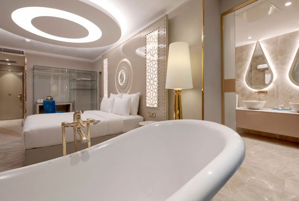 Loft (Room) | Minibar, in-room safe, individually decorated, desk