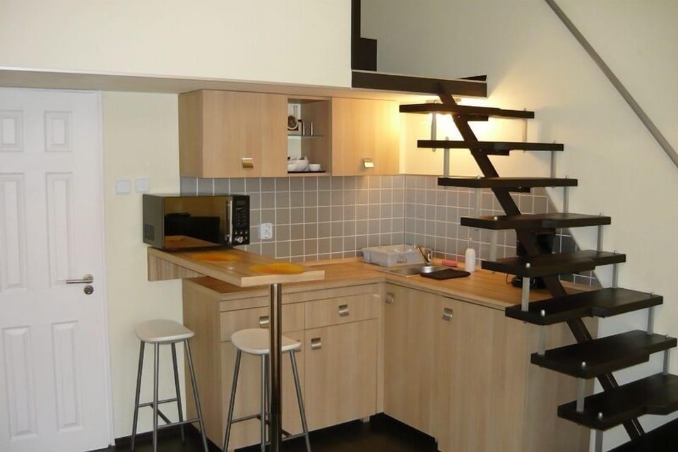 Full-size fridge, coffee/tea maker, cookware/dishes/utensils