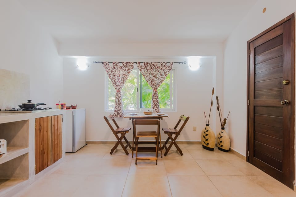 Comfort Studio Suite, 1 King Bed, Kitchen, Garden View | Private kitchen | Microwave, coffee/tea maker, toaster, cookware/dishes/utensils