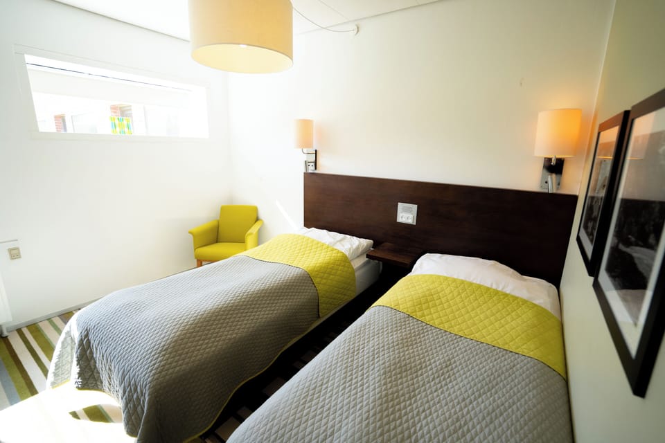 Hypo-allergenic bedding, desk, blackout drapes, soundproofing