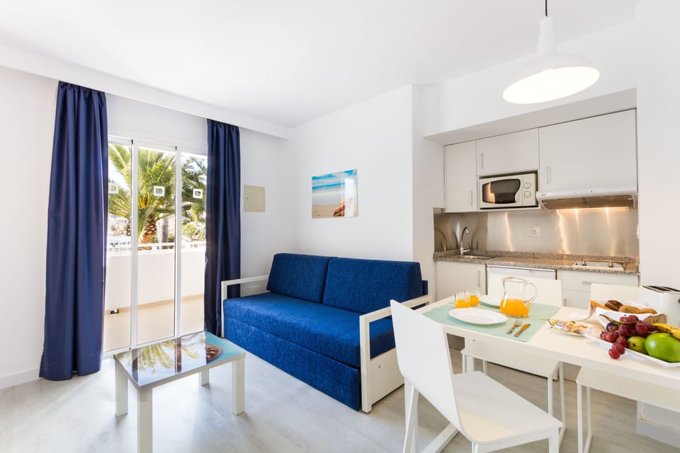 Standard Apartment, 1 Bedroom | Living area | LCD TV