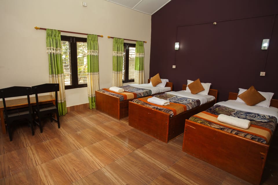 Standard Double Room | Bathroom | Shower, free toiletries, slippers, towels