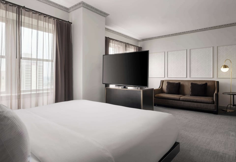 Premium bedding, down comforters, pillowtop beds, in-room safe