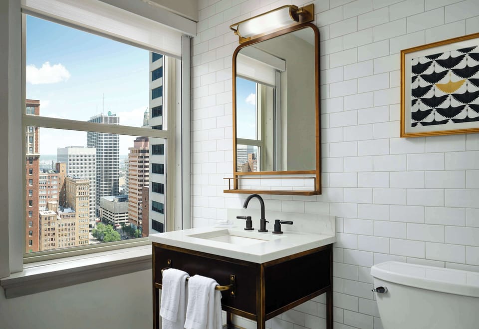 Suite, 1 King Bed | Bathroom | Free toiletries, hair dryer, towels, soap