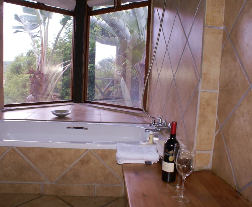 Rainfall showerhead, designer toiletries, hair dryer, towels