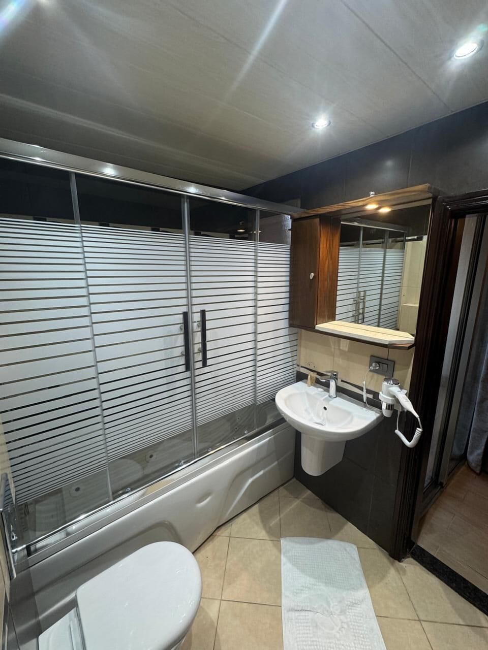 Suite, 2 Bedrooms, 2 Bathrooms, Partial Ocean View | Bathroom | Free toiletries, hair dryer, towels