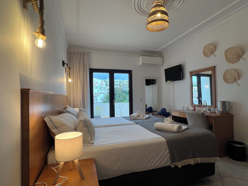Classic Double Room, Balcony | Memory foam beds, in-room safe, desk, iron/ironing board