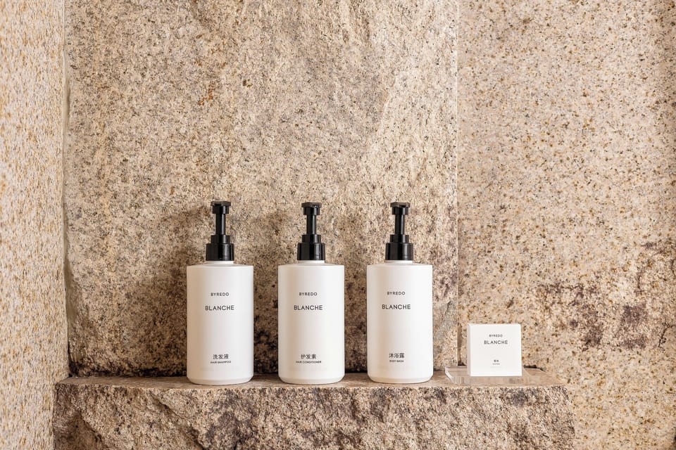 Separate tub and shower, designer toiletries, hair dryer, bathrobes