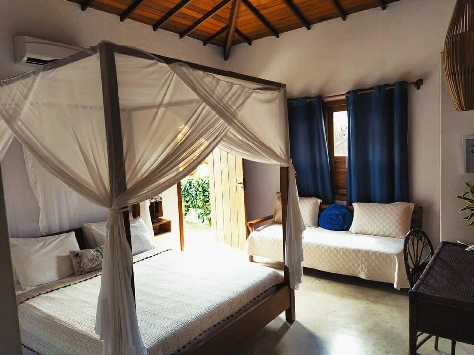 Signature Triple Room (Oxala) | In-room safe, individually decorated, laptop workspace