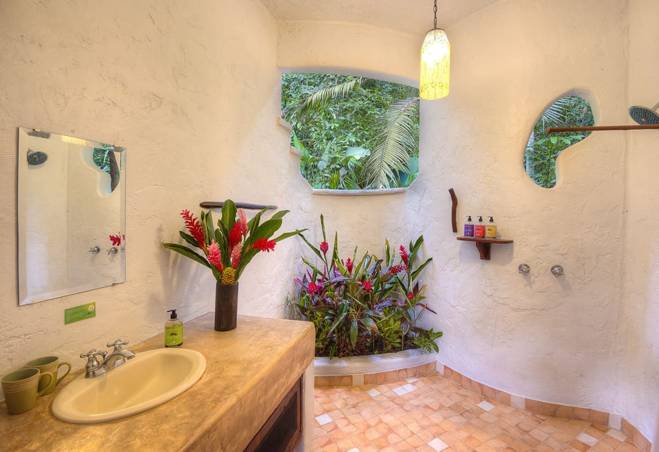 Double Room (Mango) | Bathroom | Shower, free toiletries, towels