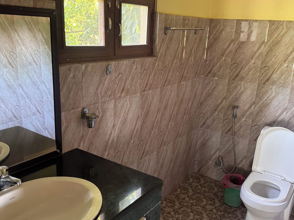 Deluxe Room, Balcony, River View | Bathroom | Shower, hair dryer, slippers, bidet