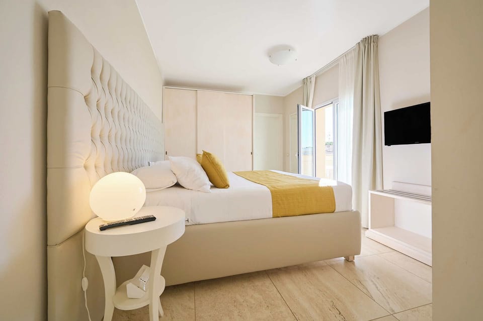 Junior Suite, Terrace | Minibar, in-room safe, desk, blackout drapes