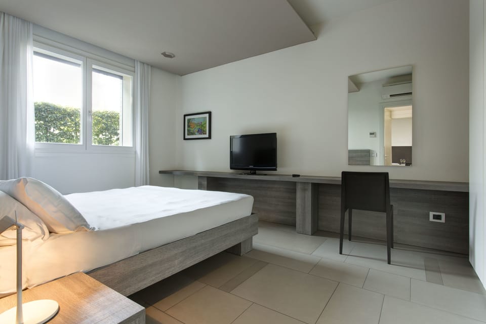 Down comforters, minibar, in-room safe, individually furnished