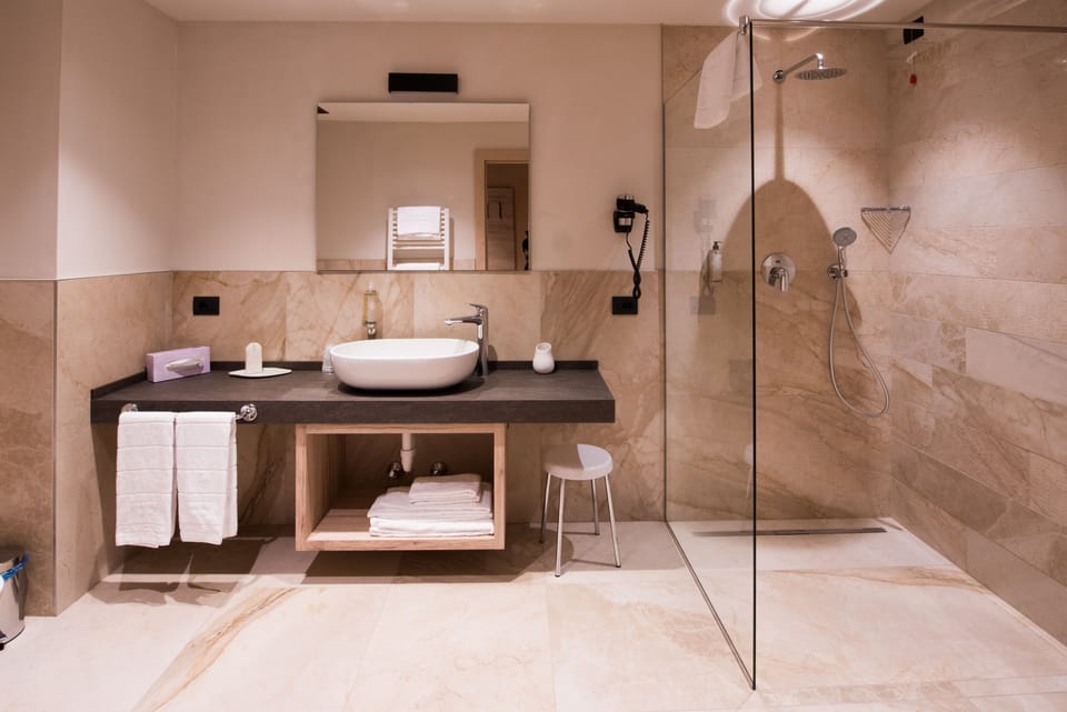 Deluxe Suite, 2 Bedrooms, Non Smoking, Mountain View | Bathroom | Free toiletries, hair dryer, bathrobes, bidet