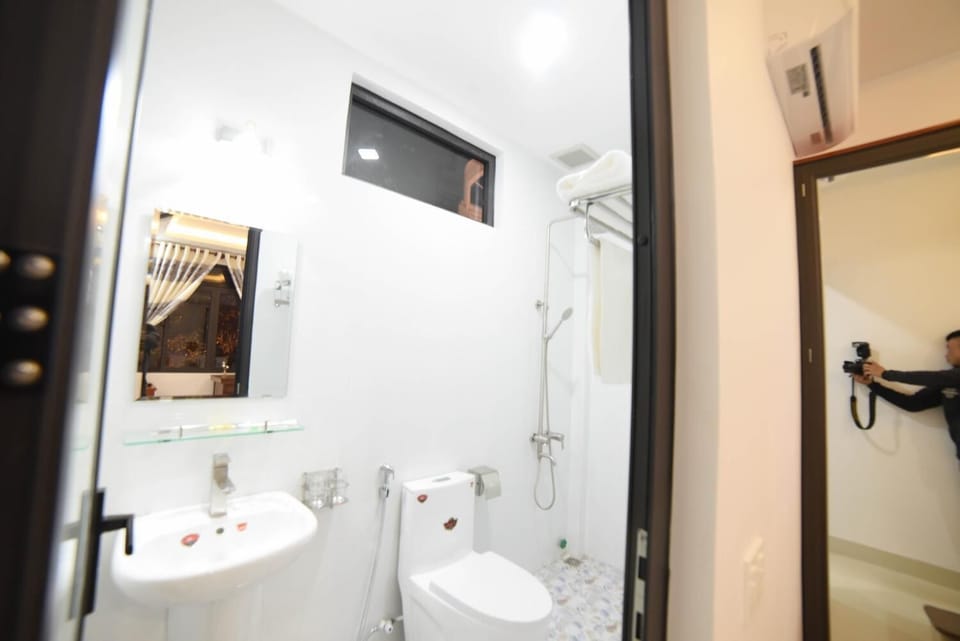 Shower, free toiletries, hair dryer, slippers