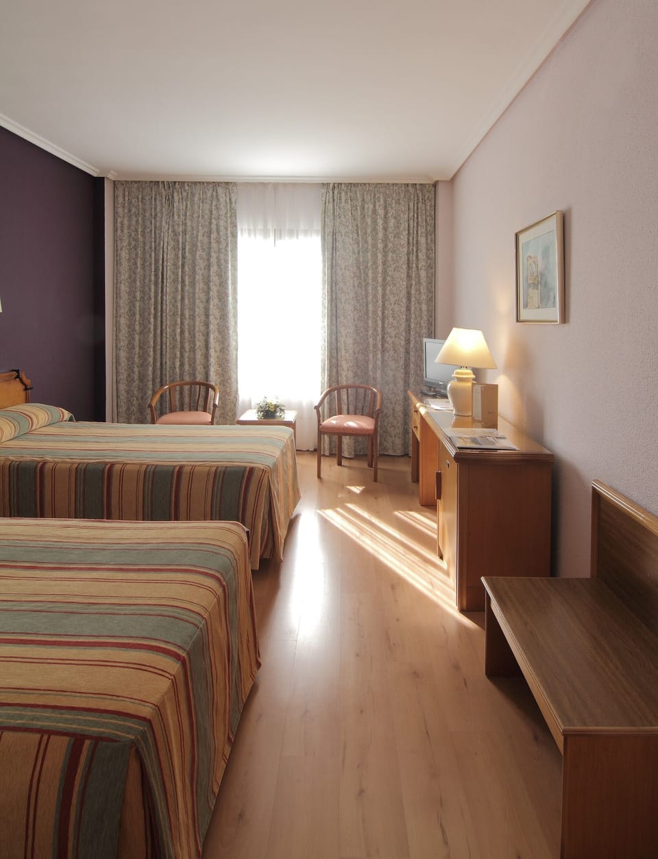 Standard Double or Twin Room | Minibar, desk, blackout drapes, iron/ironing board