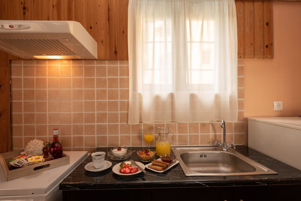 Superior Apartment, 2 Bedrooms | Private kitchen | Coffee/tea maker, stovetop, electric kettle, toaster
