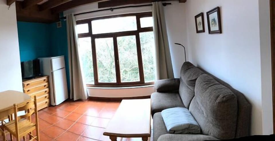 Apartment, 1 Bedroom | Living area | Flat-screen TV