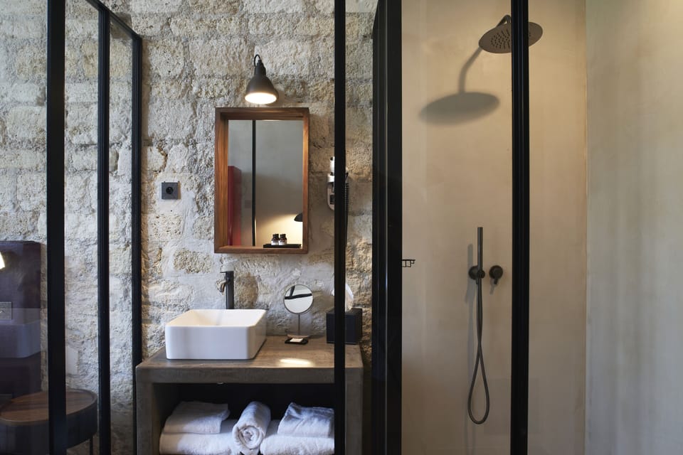 Separate tub and shower, hair dryer, bathrobes, slippers
