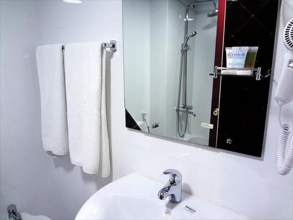 Separate tub and shower, free toiletries, slippers, towels