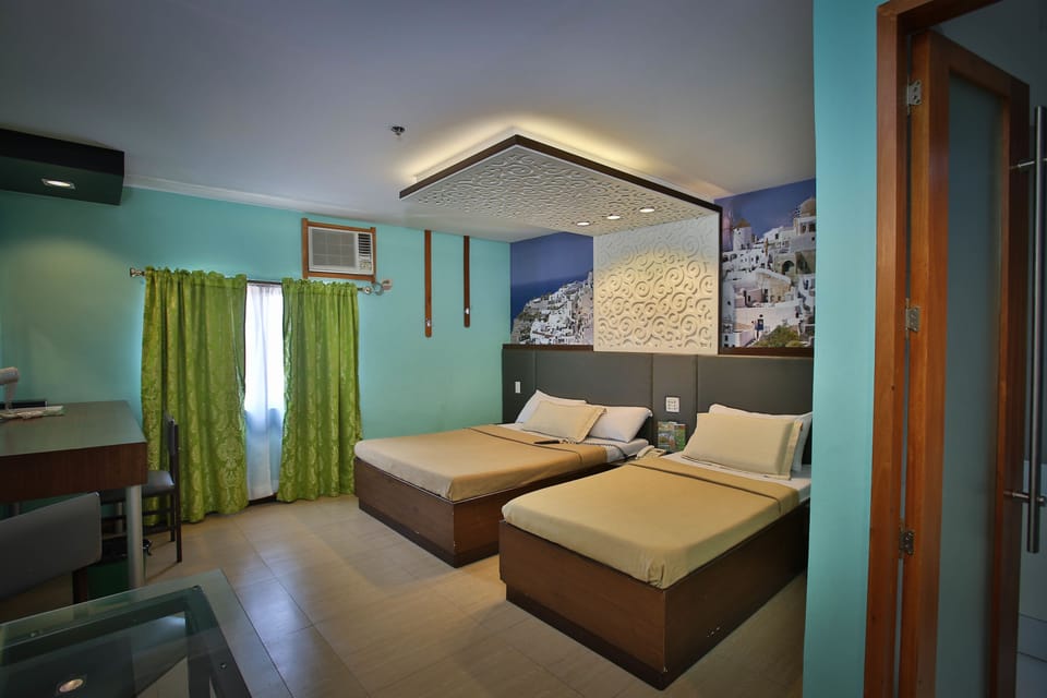 Euro Suite Two | In-room safe, desk, iron/ironing board, rollaway beds