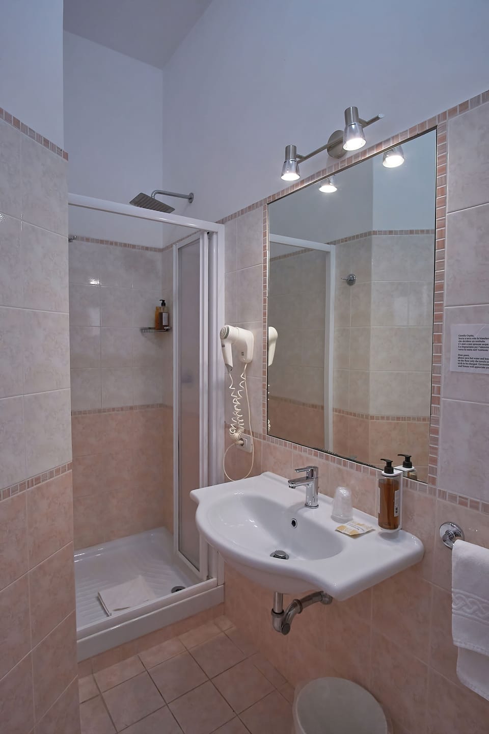 Shower, rainfall showerhead, free toiletries, hair dryer