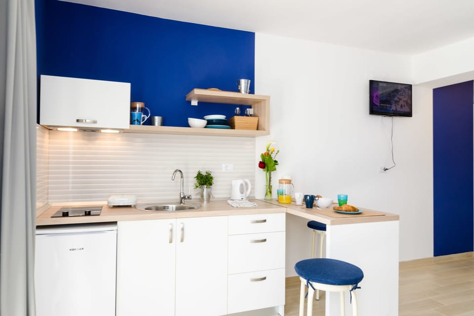 Classic Studio Suite, Terrace, Partial Sea View | Pillowtop beds, soundproofing, iron/ironing board, free WiFi