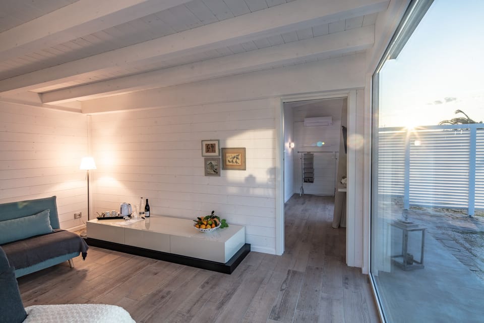 Panoramic Bungalow | Living area | 40-cm flat-screen TV with satellite channels, TV, toys