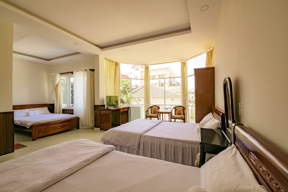 Family Room | Free minibar, desk, blackout drapes, soundproofing