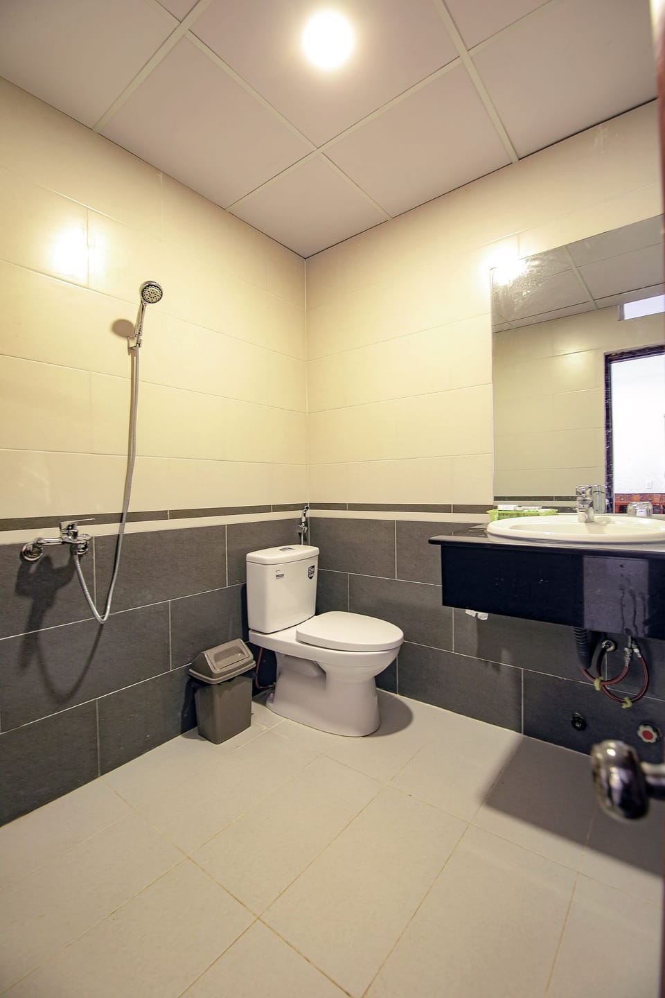 Rainfall showerhead, designer toiletries, hair dryer, slippers