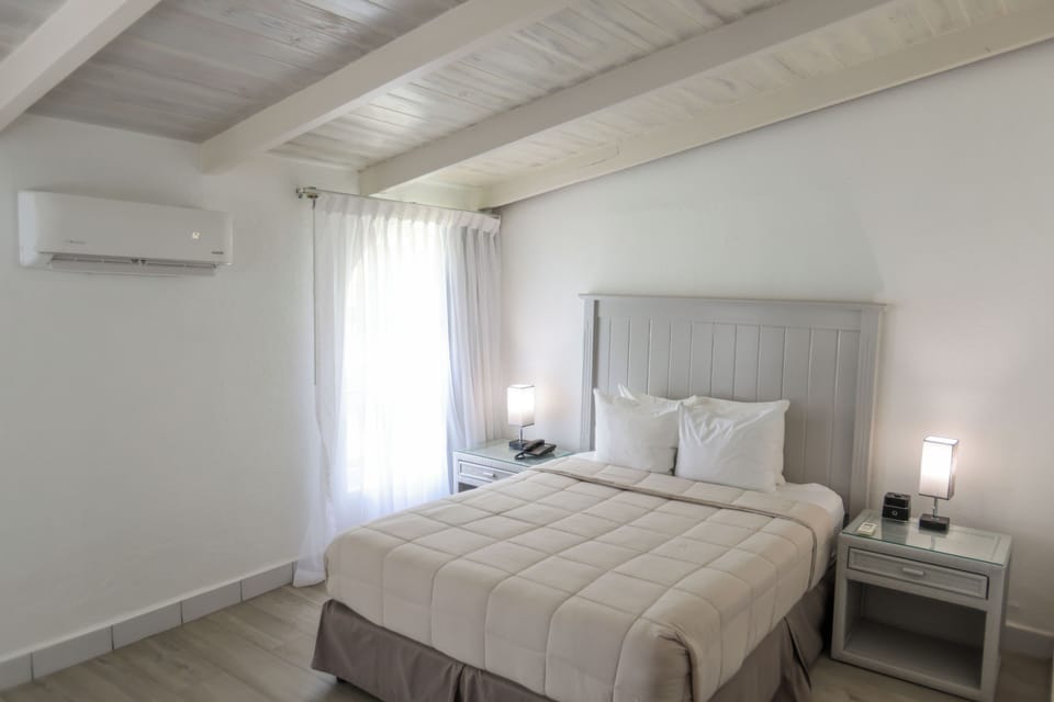 Suite, 1 Bedroom, Non Smoking, Bathtub | Premium bedding, in-room safe, blackout drapes, iron/ironing board