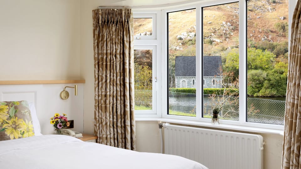 Premium Double Room | Iron/ironing board (on request), bed sheets