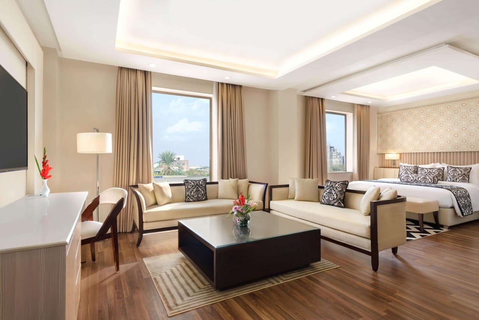 Junior Suite, 1 King Bed, Non Smoking | Minibar, in-room safe, individually decorated, individually furnished