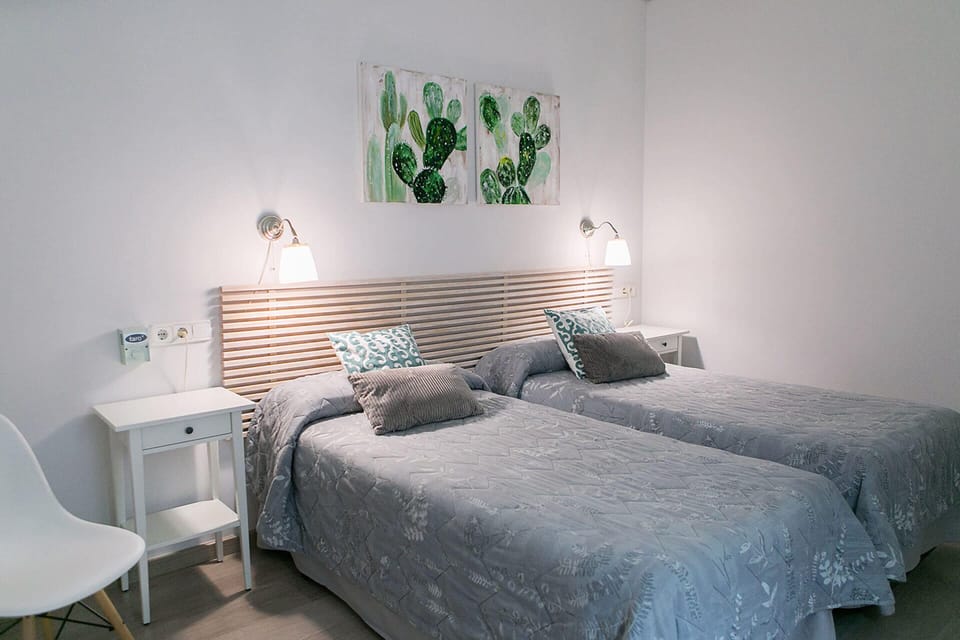 Double Room, Shared Bathroom (Interior - 2 Beds) | In-room safe, iron/ironing board, free WiFi, bed sheets