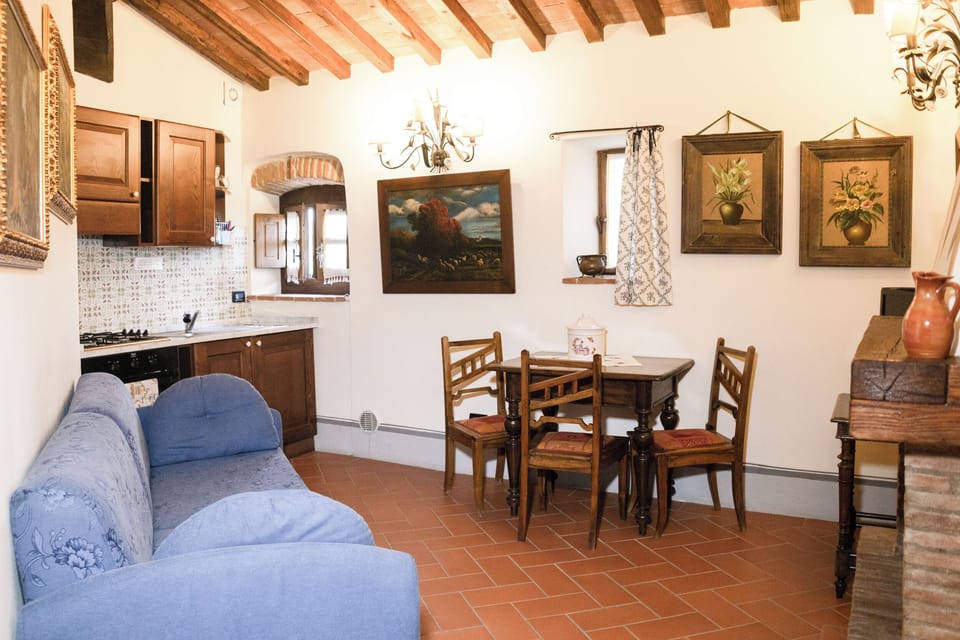 Standard Apartment, Garden View | Living area | Flat-screen TV, table tennis